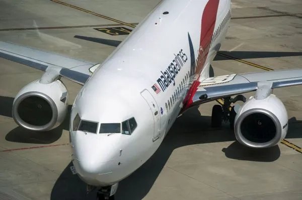 疑似MH370残骸被冲上海滩,带来新希望,失踪飞机谜团可以解开吗?